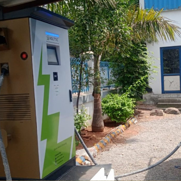 Electric vehicle charger installed on a wall